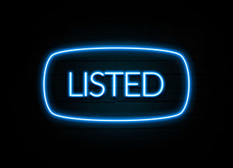 Listed  - colorful Neon Sign on brickwall