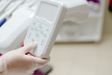 Close up of healthy care procedure. Medical health treatment process. The dentist treats a patient, medic machine office background. Modern laboratory equipment instrument technology