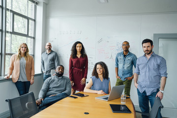 Portrait of diverse business people in conference room