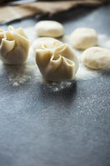 preparing of typical Mongolian meal: Buuz (Steamed Mongolian Dumplings) 