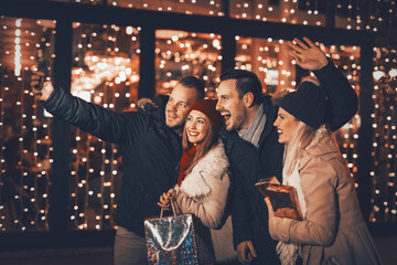 Young Friends Having Fun On Shopping Mall