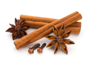Cloves, anise and cinnamon isolated on white background.