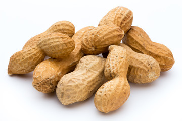 Dried peanuts on the white background.