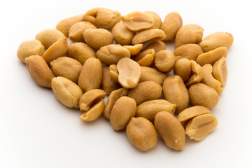 Peeled peanuts on the isolated background.