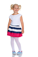 Fashionable little girl in a dress