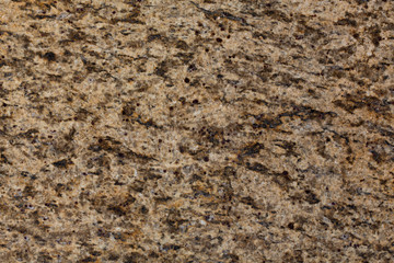 Beige granite texture floor panel background.