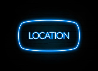 Location  - colorful Neon Sign on brickwall