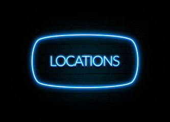 Locations  - colorful Neon Sign on brickwall