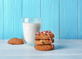 Delicious oatmeal cookies with raisins on wooden table