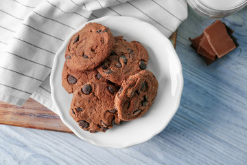 Delicious oatmeal cookies with chocolate chips on plate