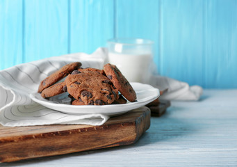 Delicious oatmeal cookies with chocolate chips on plate