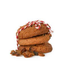 Delicious oatmeal cookies with raisins on white background