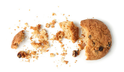 Delicious oatmeal cookie with raisins on white background