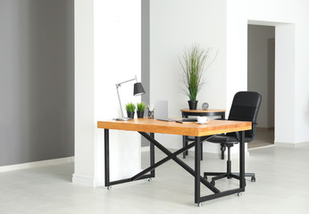 Interior of modern room with comfortable workplace