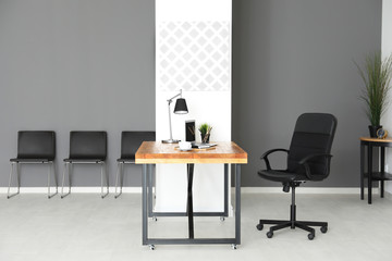 Interior of modern room with comfortable workplace