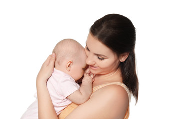 Happy young woman with cute baby on white background
