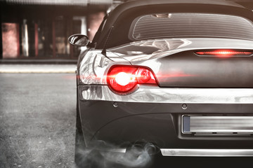 Machine, rear view, exhaust pipe