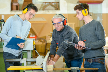 Male students in a woodwork class