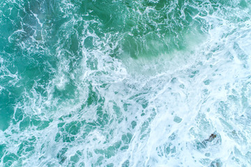 the surface of the water, turquoise in color with bird's eye