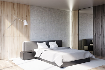 Concrete and wooden bedroom, side
