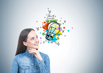 Cheerful young woman in a jeans shirt, idea