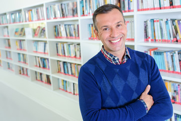 Portrait of middle aged man in library