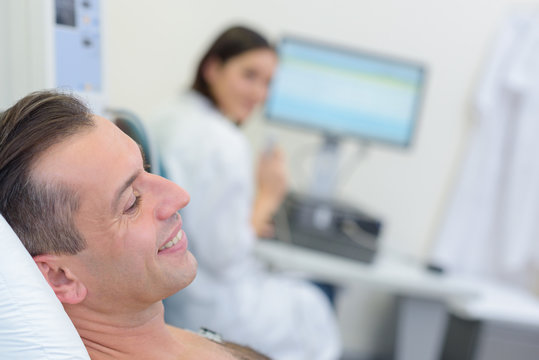 man undergoing chest examination