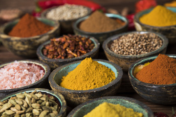 Wooden table of colorful spices