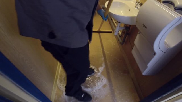 public restroom floor swiping
