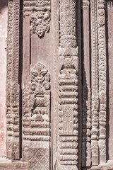 handcrafted beautiful wooden pillar of a temple