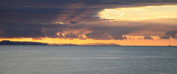 Sunset over Catalina Island from Crystal Cove State Park Beach