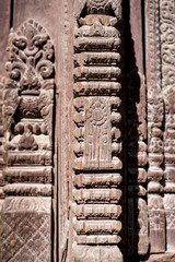 handcrafted beautiful wooden pillar of a temple