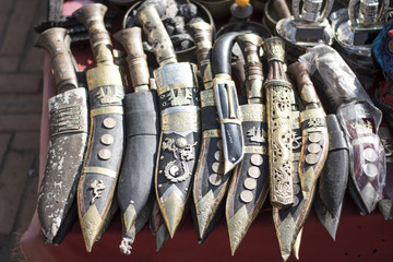 Nepali knife khukuri with wooden scabbard in a row for sale