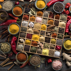 Wooden box with spices and herbs