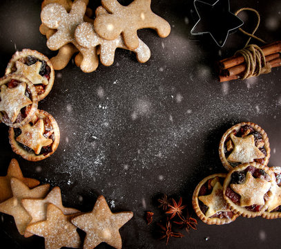 Christmas sweets and decoration. Mince pie and cookies.