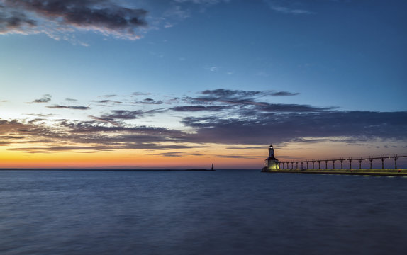 Lighthouse at sunset sky on Lake Michigan, Indiana, USA