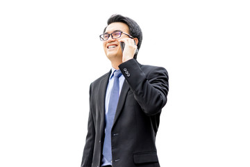 Closeup portrait of asian handsome business man using cell phone, smiling, isolated on a white background