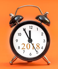 2018 written on clock face. New year 2018.