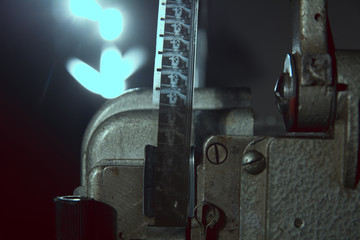 Close-up of 16 mm film on the projector