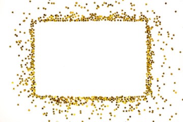 Star shaped golden sequins frame arranged in a rectangular form.
