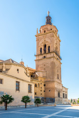 Fototapeta na wymiar View at the Bell tower of Cathedral in Guadix, Spain