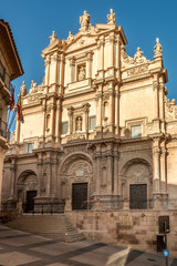 Fototapeta na wymiar View at the facade of Cathedral San Patrick in Lorca, Spain