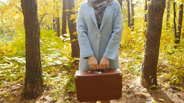 Beautiful fashion woman in autumn park
