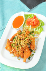 Fried Chicken with herbs and salad