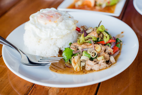 stir-fried pork and herb with rice or stir-fried Jango, Thai food