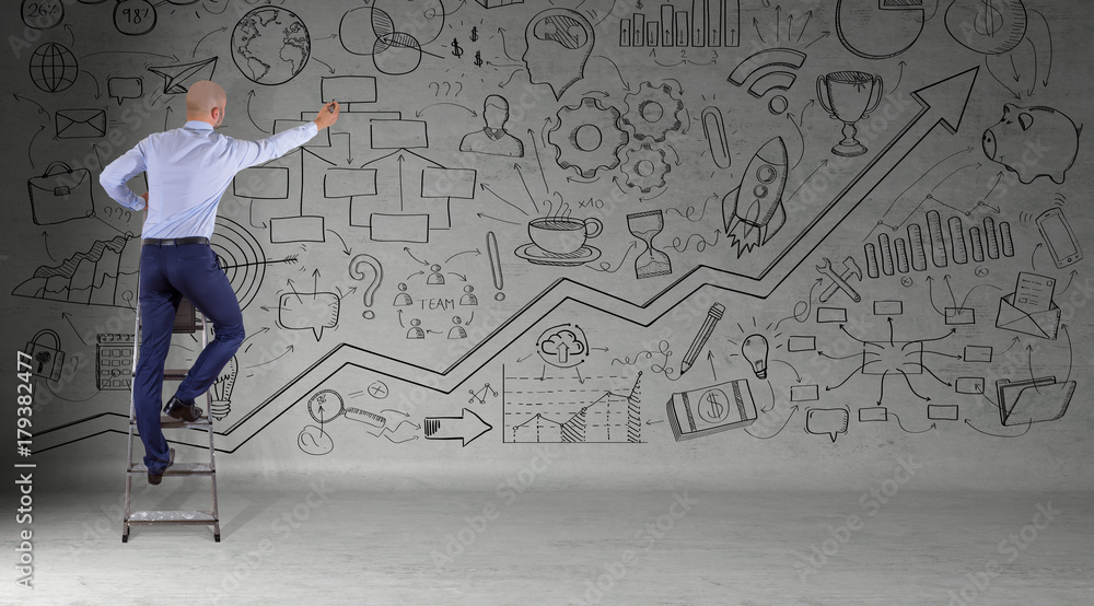 Aufkleber businessman watching a project sketch on a wall 3d rendering