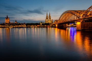 Fototapeta na wymiar Cologne Cathedral and Hohenzollern Bridge at night, Germany