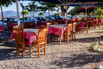 Early morning traditional colorful tavern restaurant by the beach