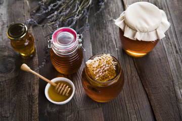 Fresh honey on wooden table