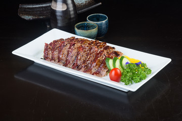 japanese cuisine. fried fish on the background